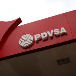 The corporate logo of the state oil company PDVSA is seen at a gas station in Caracas