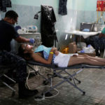 Patient is attended by staff of the United States Navy hospital ship USNS Comfort at the Divina Pastora high school in Riohacha